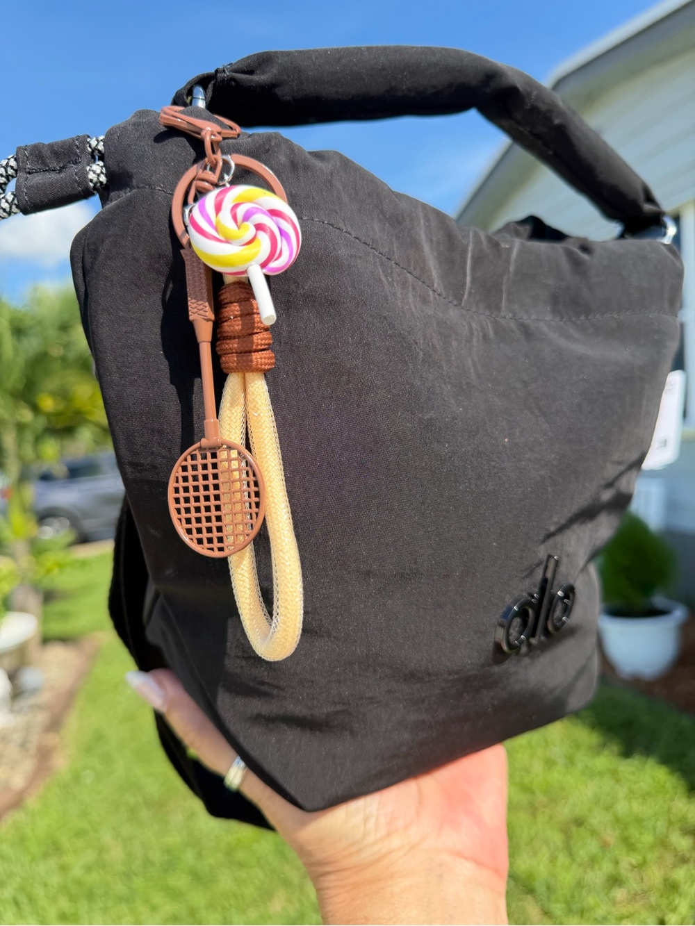 ALO Yoga Black Drawstring Mini Bucket Bag with Candy Charm - Picture 9 of 16